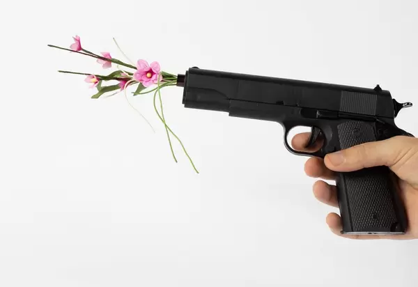 Gun with flower