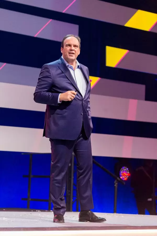 Hagen Rickmann, Director for Business Customers at Telekom Deutschland, addresses the audience of the Digital X event in Cologne, Germany