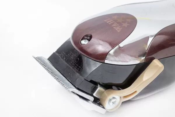 Haircut Trimmer closeup imate with copy space above white background