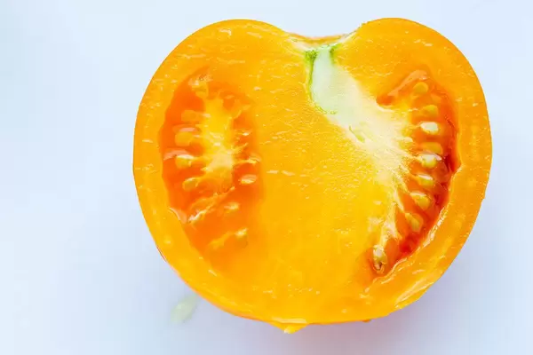 Half a fresh yellow tomato. Top view (Flip 2019) (Flip 2019)