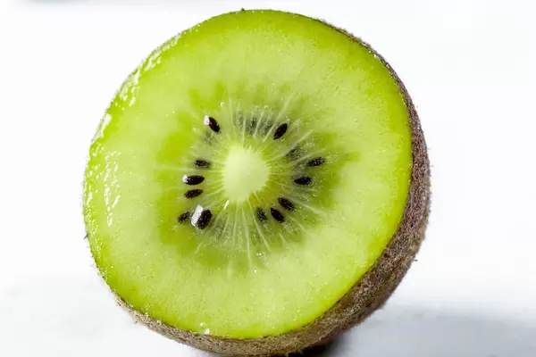 Half fresh kiwi close-up