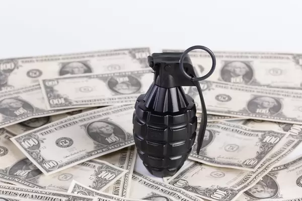 Hand grenade with Dollar banknotes