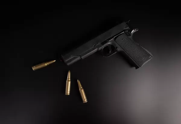 Hand gun with bullets