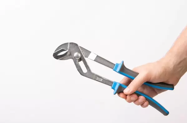 Hand holding adjustable water pump pliers (Flip 2019)
