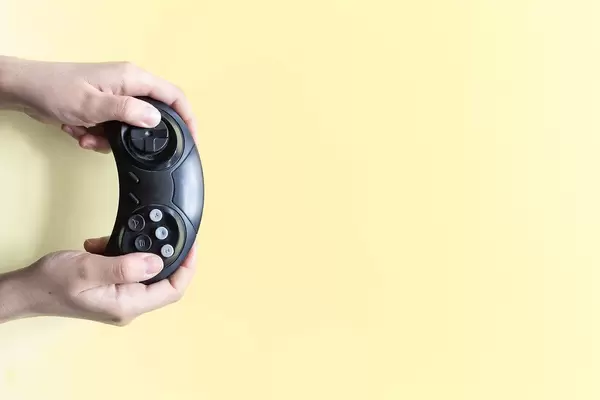 hand holding gamepad