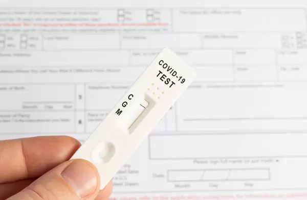 Hand holds a negative covid-19 antigen test
