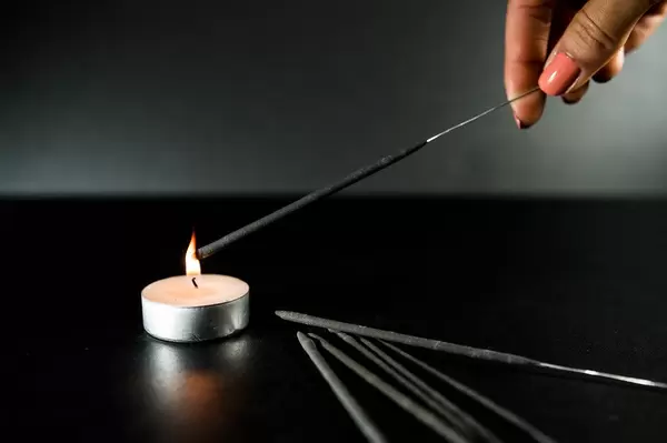 Hand lighting a christmas sparkler