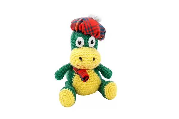 Hand made dinosaur isolated on white background