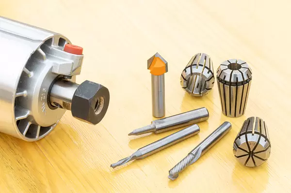 Hand router with router bits and er collets