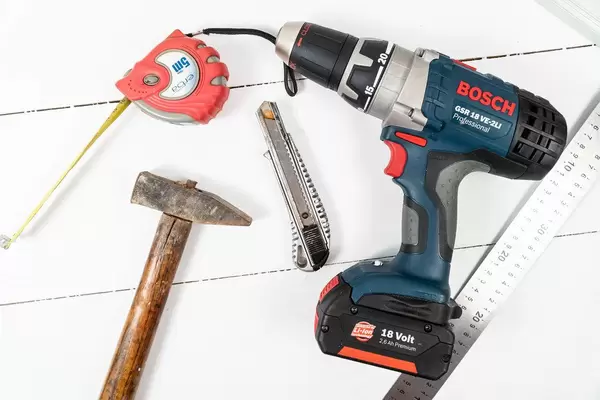 Hand Tools on the white wooden background