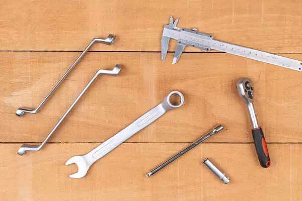 Hand tools on the wooden table concept