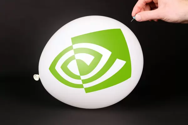 Hand uses a needle to burst a balloon with Nvidia icon