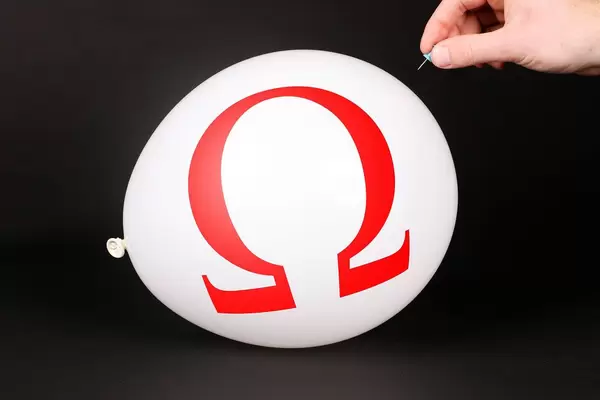 Hand uses a needle to burst a balloon with Omega logo
