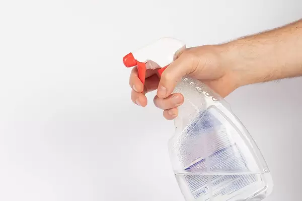 Hand with a cleaning product (Flip 2019)