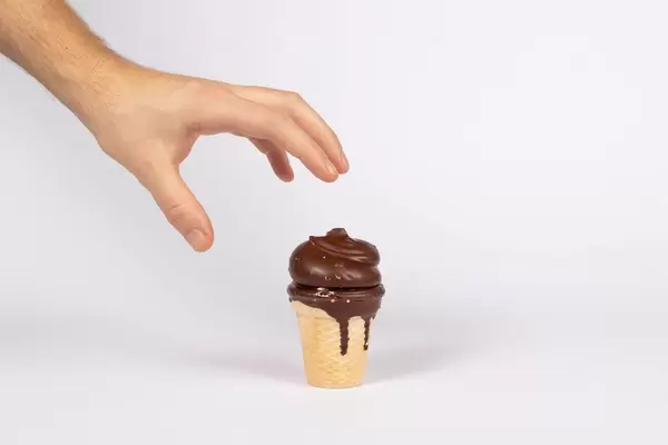 Hand with waffle cup