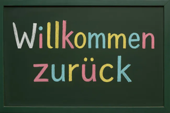 Handgeschriebener Gruß auf Kreidetafel