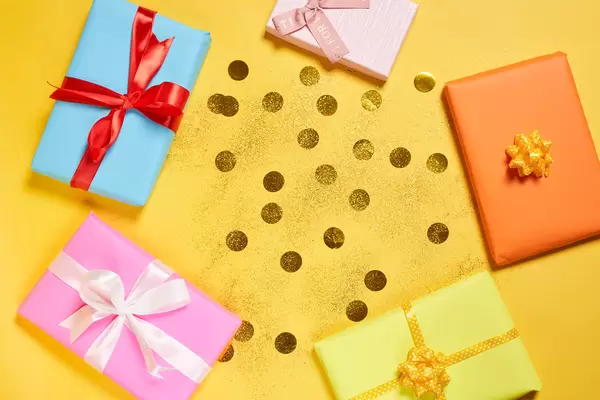 Handmade presents - gift boxes packaged in craft paper and tied with colorful ribbons