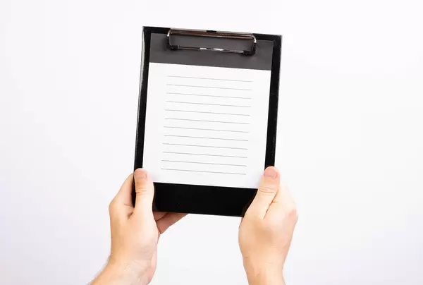 Hands showing blank paper