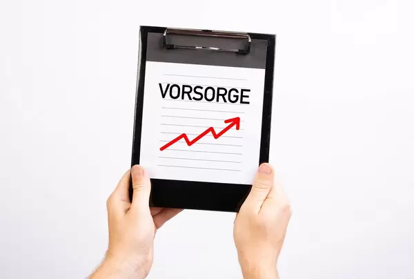 Hands showing paper with Vorsorge text