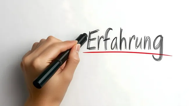 Handschriftlicher Text 'Erfahrung' mit rotem Unterstrich