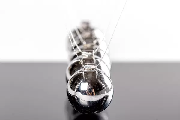 Hanging balls of newton close-up