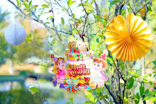 Happy Birthday card on a tree, outdoor party (Flip 2019)