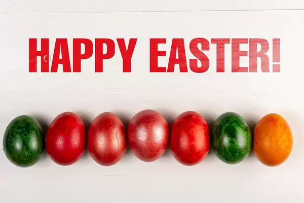 Happy Easter text with Colored Easter Eggs