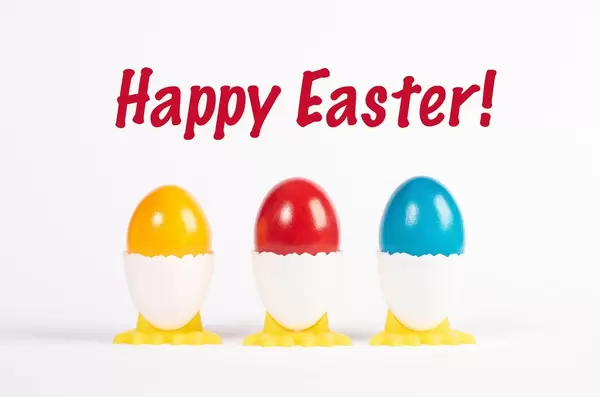 Happy Easter text with painted Easter eggs