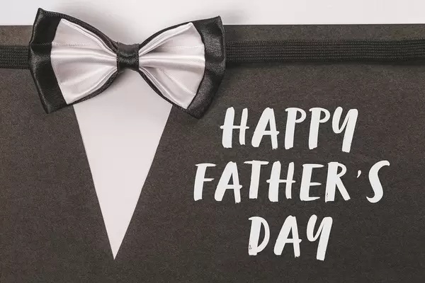 Happy fathers day greeting card with bow tie