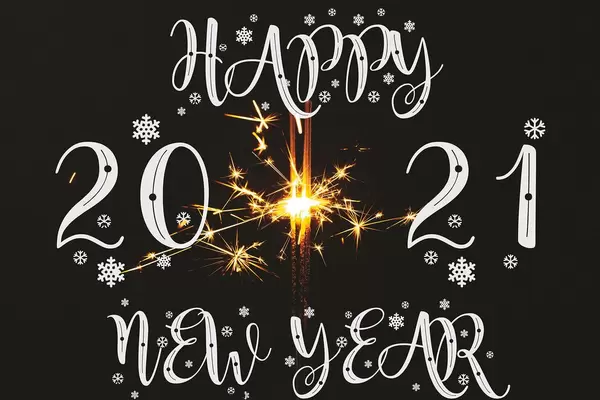 Happy new year background with glowing sparkles of bengal lights