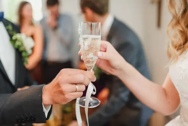 Happy Newlyweds Couple Drink Wedding Champagne