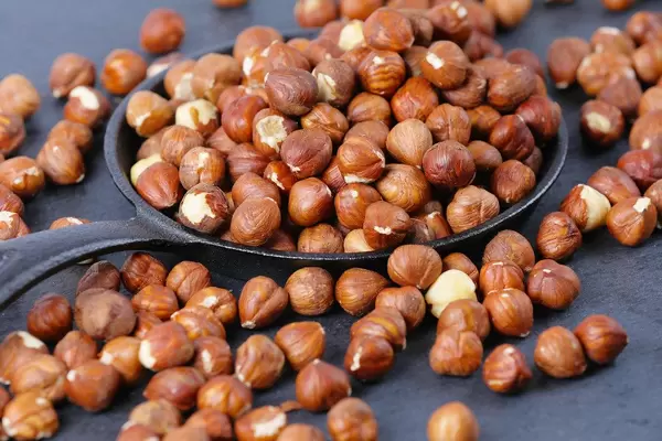 Hazelnuts in pan, close-up view