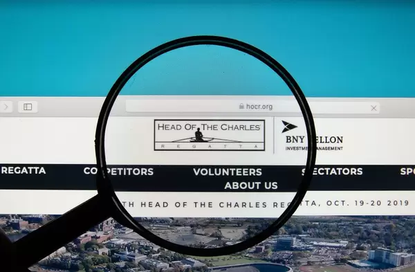 Head Of The Charles Regatta logo on a computer screen with a magnifying glass