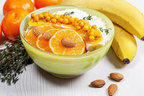 Healthy Breakfast-oatmeal with fruit and nuts