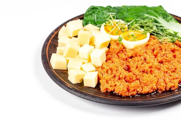 Healthy Breakfast with cheese, eggs and zucchini ragout (Flip 2020)