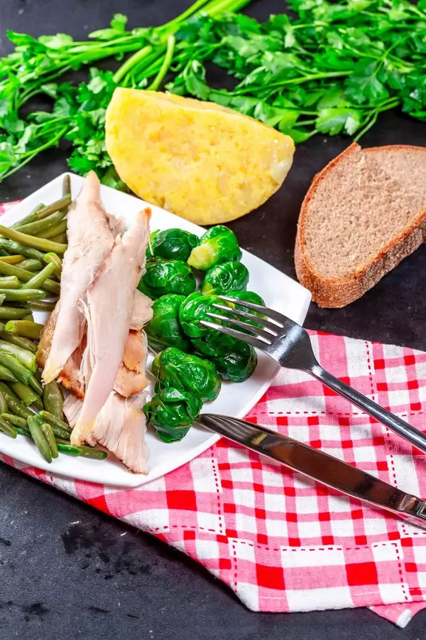 Healthy Breakfast with chicken, vegetables, herbs and cheese
