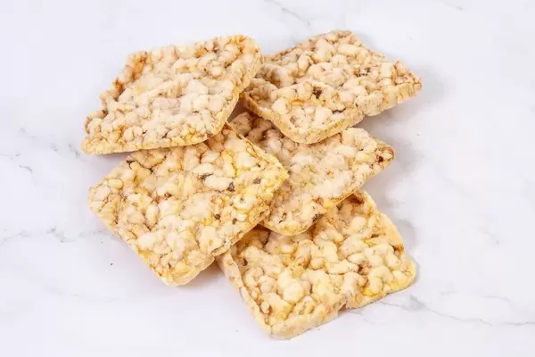 Healthy Corn Crackers on the white background (Flip 2019)