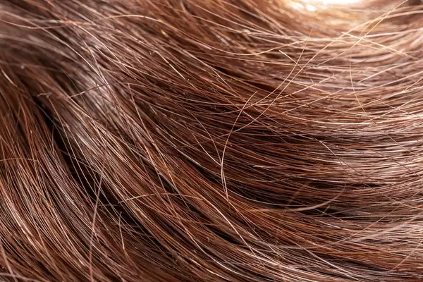 Healthy long dark hair background, close- up