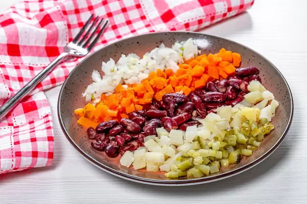 Healthy lunch with boiled vegetables and pickles with onions (Flip 2019)