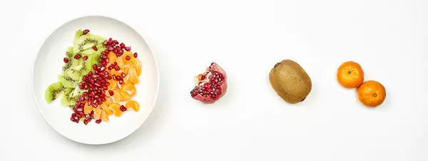 Healthy tropical fruits based salad on white