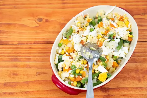 Healthy vegetables salad in the bowl with copy space