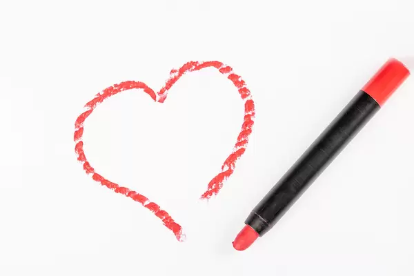 Heart drawn with lipstick on a white background