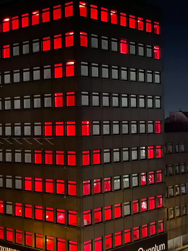 Heart illuminates the building at Hohenzollernring 62 in Cologne to give courage to the city during the lockdown