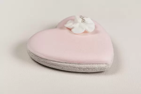 Heart shaped gingerbread with pink icing