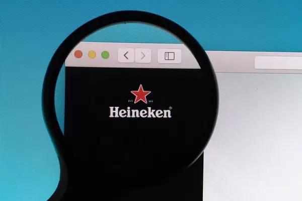 Heineken logo under magnifying glass