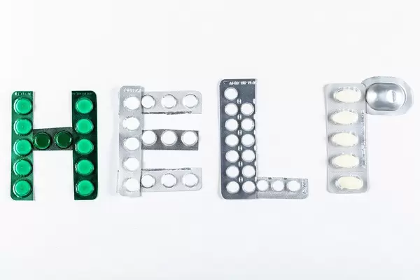 Help from tablets in blisters on a white background