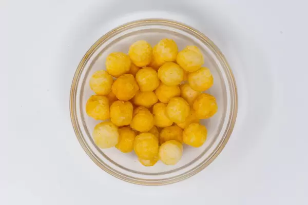 High Angle Shot - ape - Vegan Coconut and rice puff balls with cheese flavour