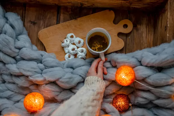 Holding Warm Green Tea With Meringues Beze Cookies On Rustic Set.jpg