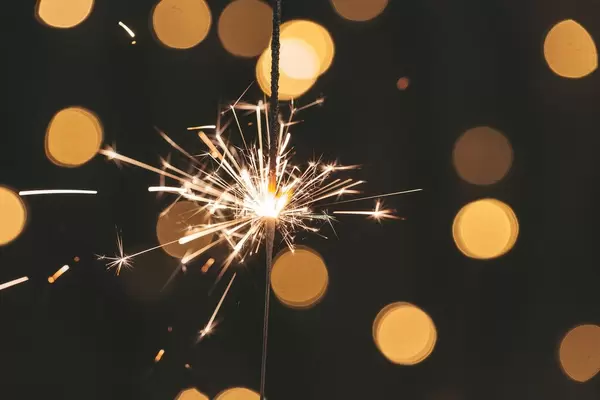 Holiday background with a sparkler