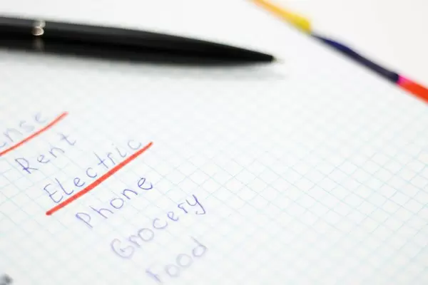 Home budget. Calculating monthly expenses for rent, electricity, phone, grocery and food